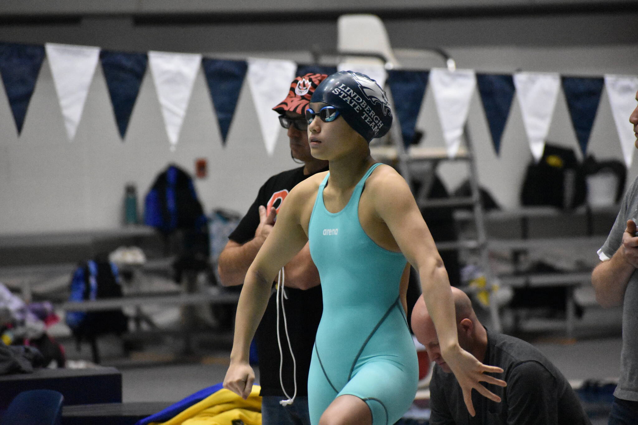 Senior Caelee Truong preparing for her 50-yard freestyle final race. Ben Ray/Sound Publishing