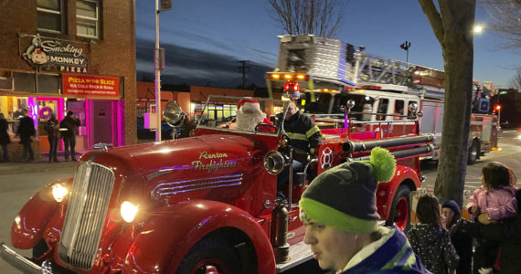 After the tree lighting, Santa Claus rolled up with his friends at Renton Regional Fire Authority, Saturday, Nov. 30, 2019, at Piazza Park. File photo