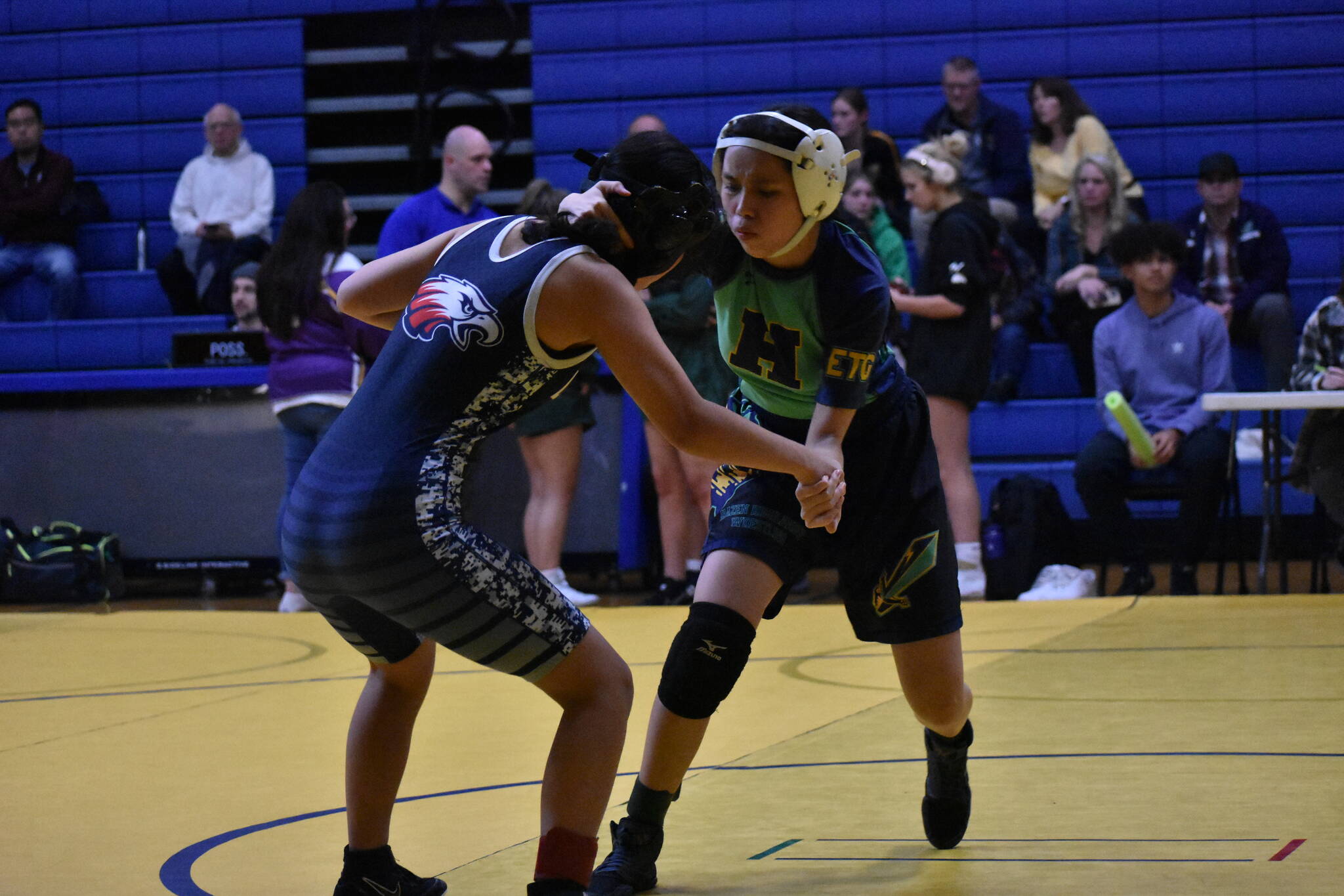 Photo by Ben Ray
Lindbergh and crosstown rival Hazen get after it in the opening match of the evening.