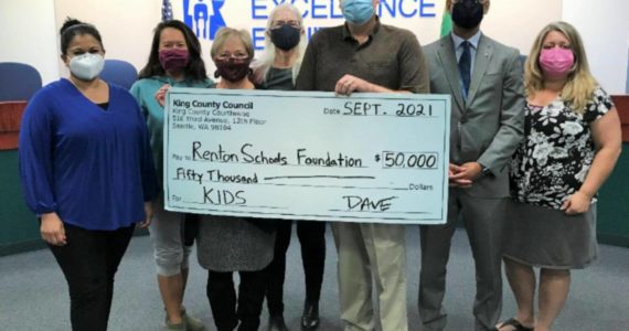 Courtesy of Renton School District
King County Councilmember, Dave Upthegrove, presents grant to the Renton Schools Foundation