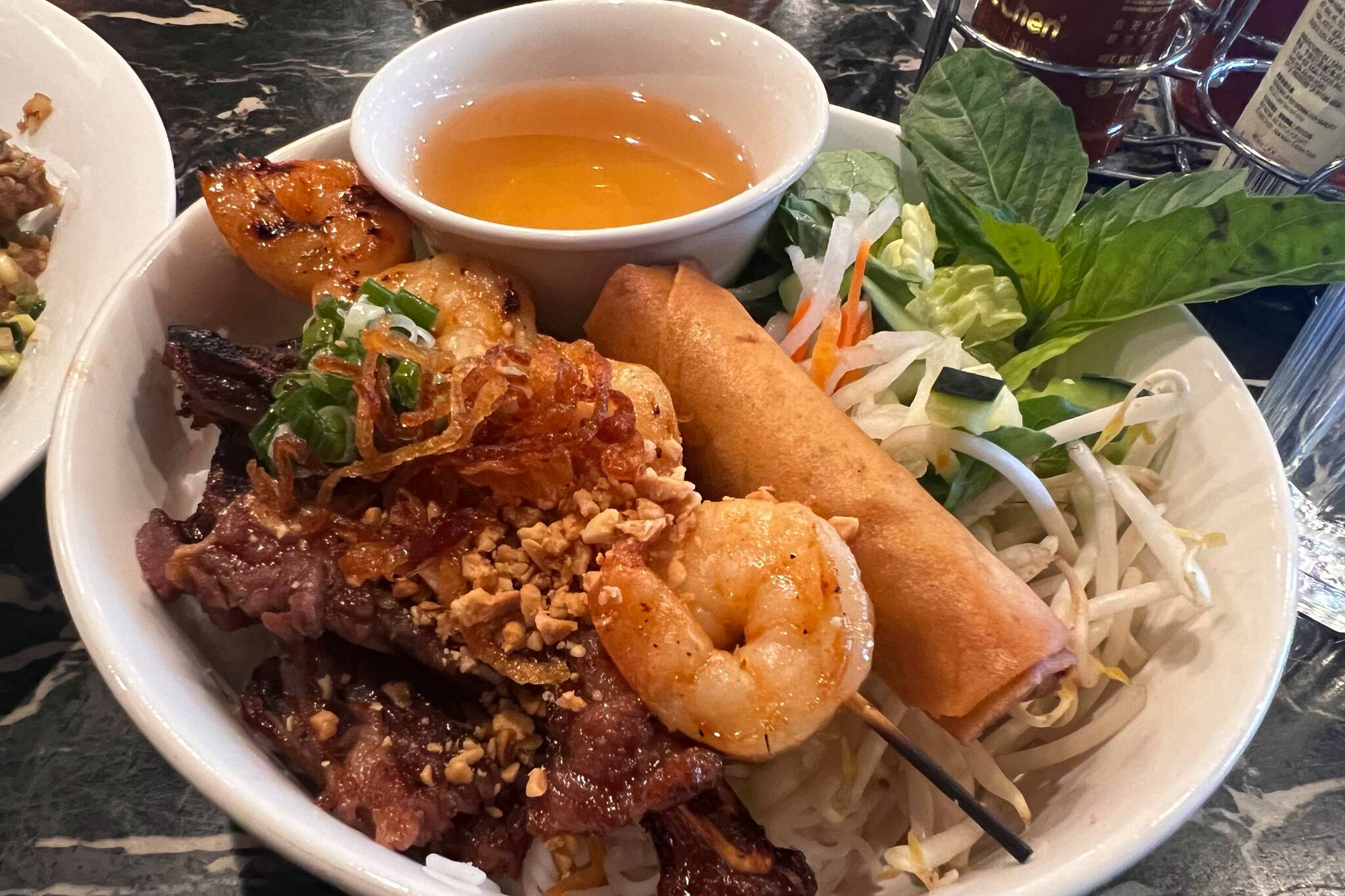 Short rib, shrimp skewer and egg roll vermicelli noodle bowl from Viet’s Phoody. Cameron Sheppard/Sound Publishing