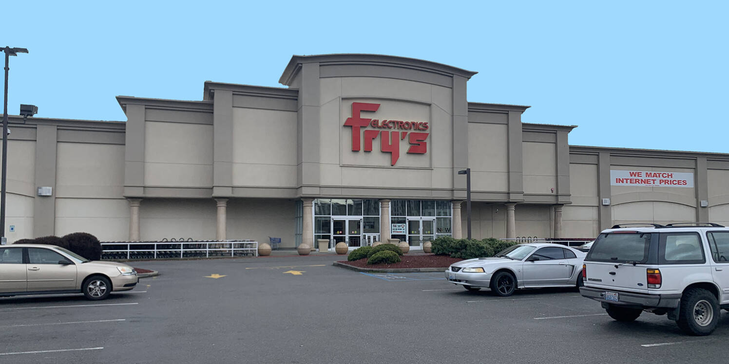 Fry’s Electronics in Renton permanently closed in 2021 and owners of now-vacant site seeks to build housing and retail units over the next decade. Photo courtesy of Bay West Development