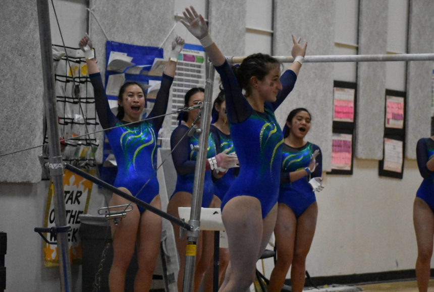 <p>Hazen gymnasts supporting their teammate with cheers. Ben Ray/Renton Reporter</p>