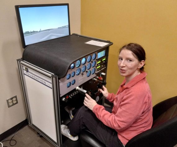 Photos by Robert Whale, Auburn Reporter
Colie Brooks at work learning how to integrate wing flaps into her landing procedure on a simulator at the GRC Aviation Center.