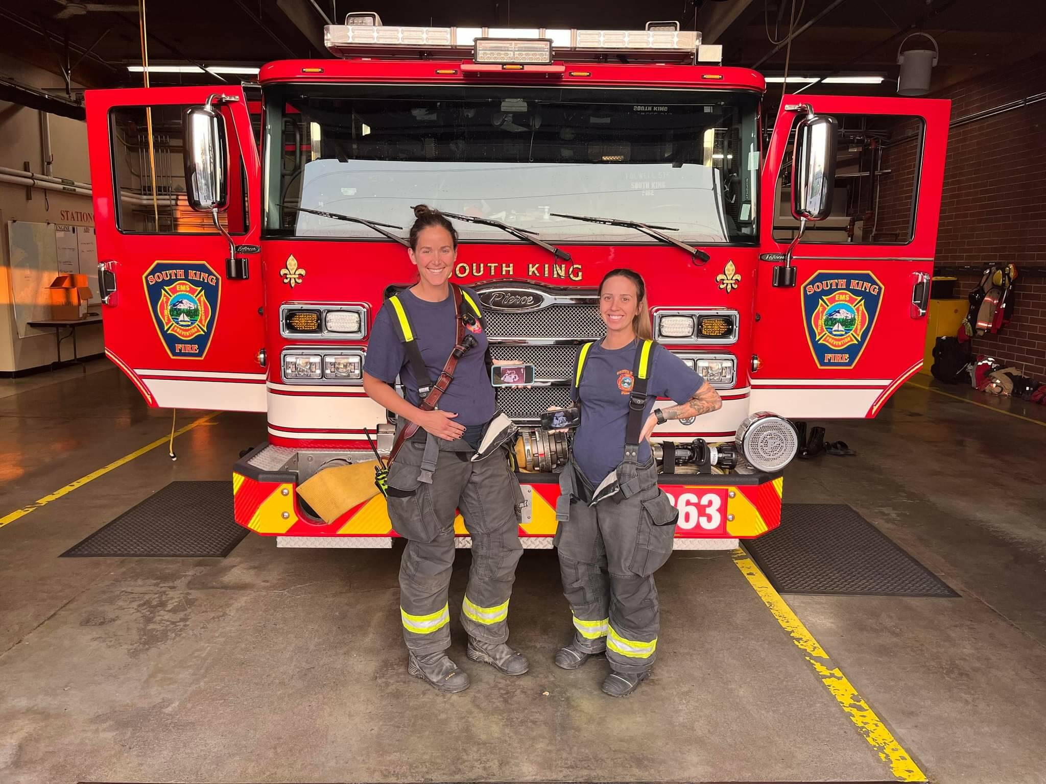 Photo courtesy of Ann Hoag
Lt. Ann Hoag and firefighter Amanda Weed pose for a photo holding each of their ultrasound photos at Station 63 in October 2022.