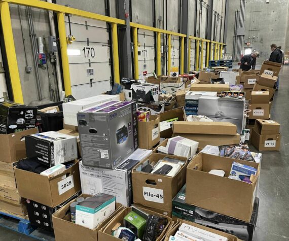 Stolen merchandise is piled up at the Safeway Distribution Center, the result of the Auburn Police Department’s multi-jurisdictional investigation into a pawn shop scheme. (Photo courtesy of Auburn Police Department)