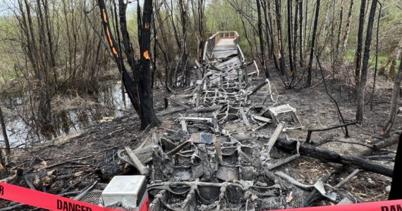 Damage to the Springbrook Trail boardwalk and the surrounding vegetation and environment resulted from a fire on April 15.(Courtesy of Randy Corman)