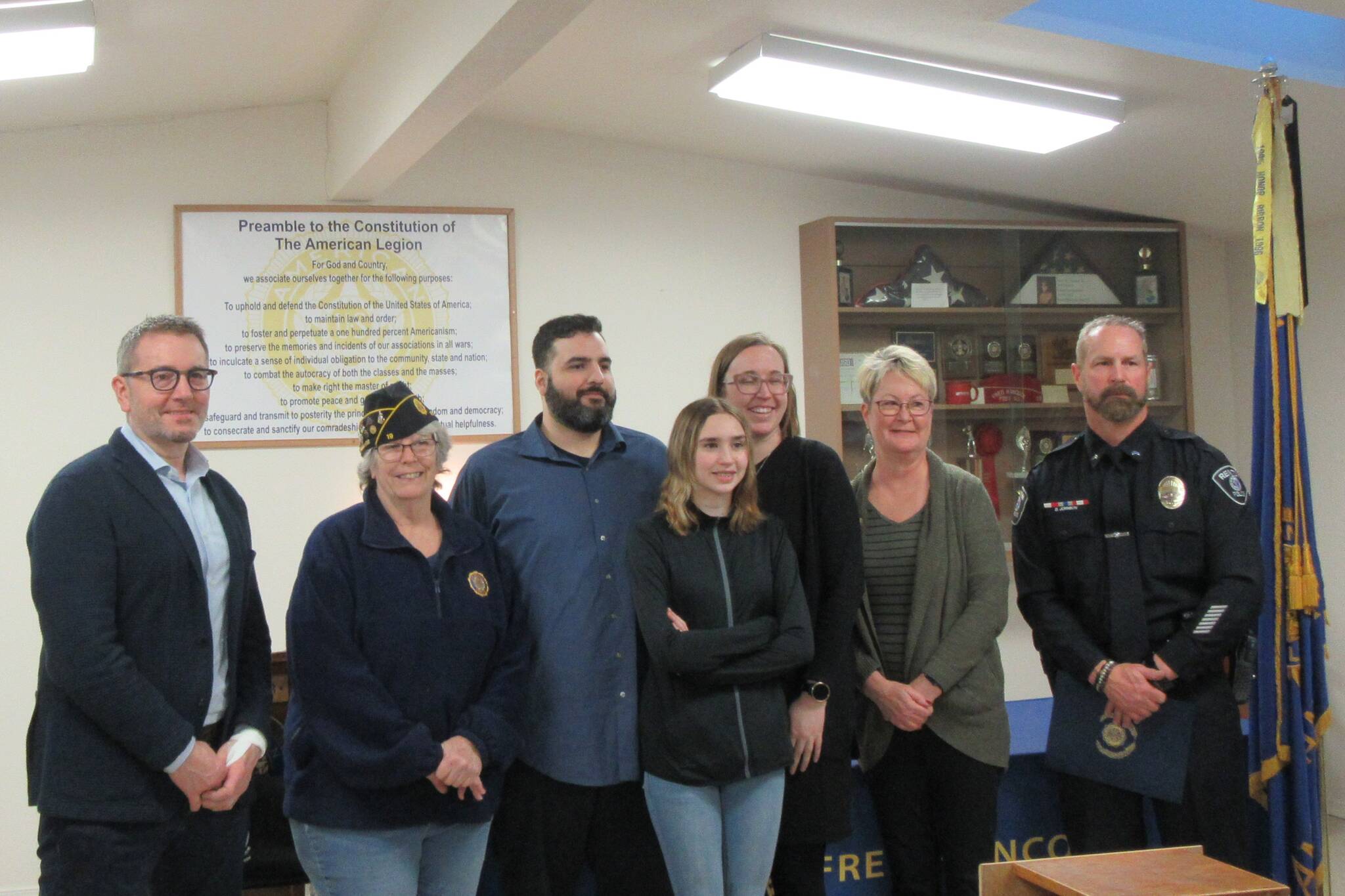 From left: Mayor Pavone, Post Commander Patty Reese, Eric Maestas, daughter Emaline, wife Brianna, Lora Ueland of Valley Communications and Officer Johnson. Courtesy photo