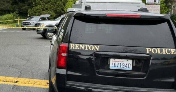 Renton police investigate the scene of a 17-year-old teenager's homicide near Safeway. (Courtesy of Randy Corman)