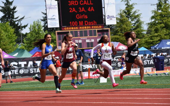 Kayla Kittrell on her way to a podium position in the 100-meter sprint. Ben Ray / The Reporter