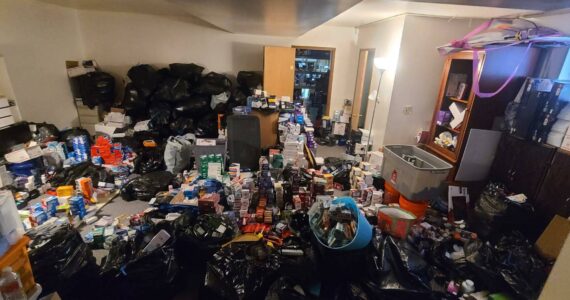 Courtesy of the Renton Police Department
Stolen merchandise piles high at the Federal Way residence of a man suspected of trafficking in stolen merchandise.