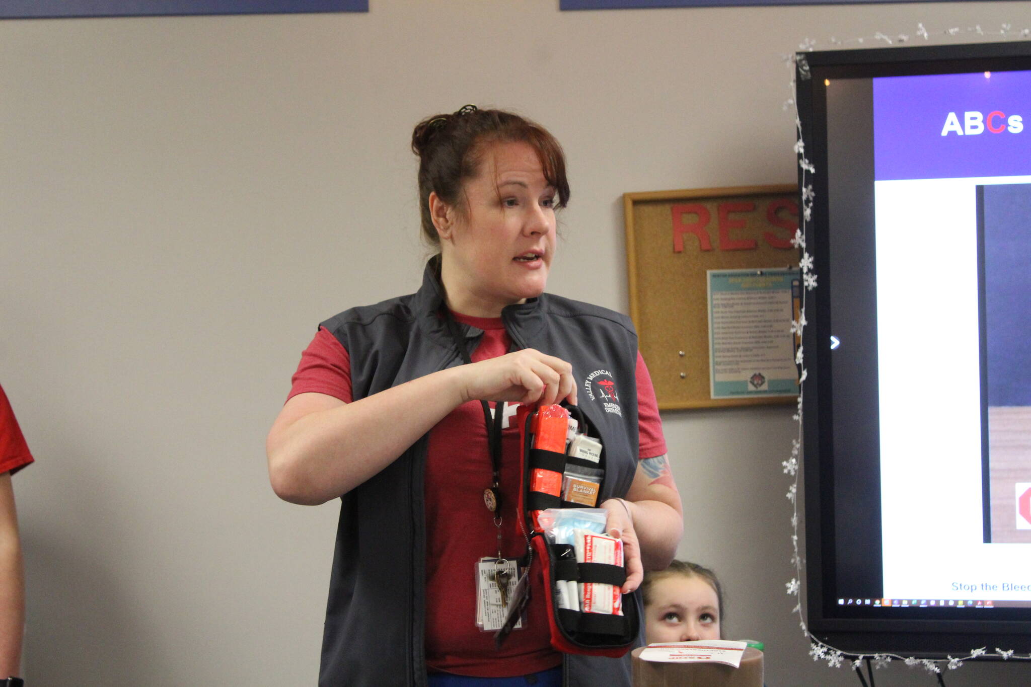 Katherine Bendickson shows the people in her latest training course the Stop The Bleed kit that every school in the Renton School District will receive. Photo by Bailey Jo Josie/Sound Publishing.
