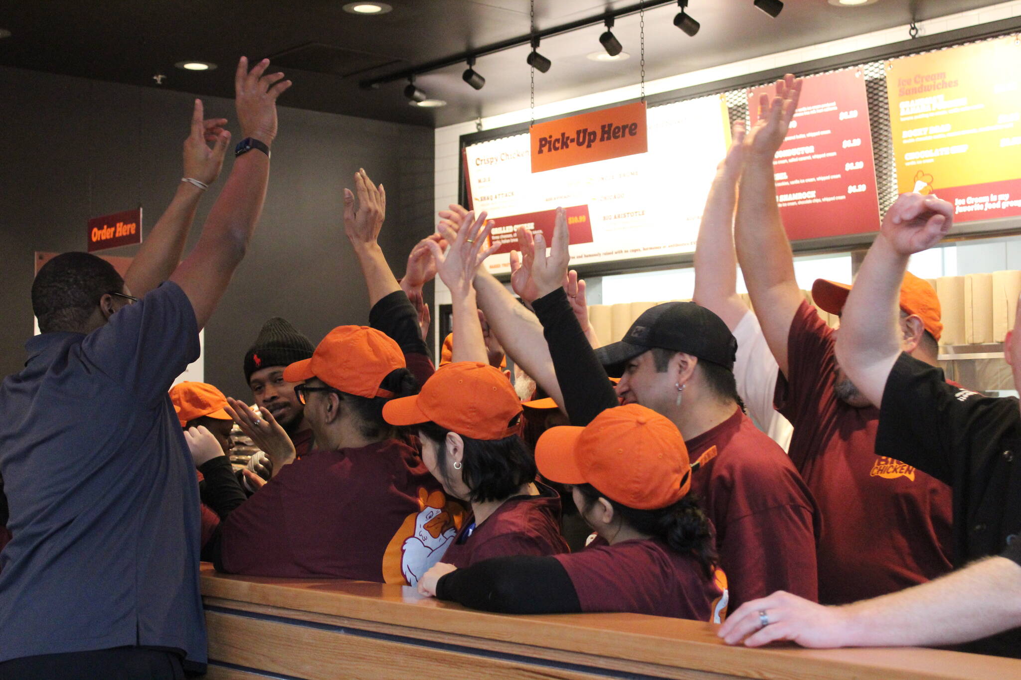Photo by Bailey Jo Josie/Sound Publishing.
Minutes before Big Chicken’s grand opening, the crew brought all hands in.