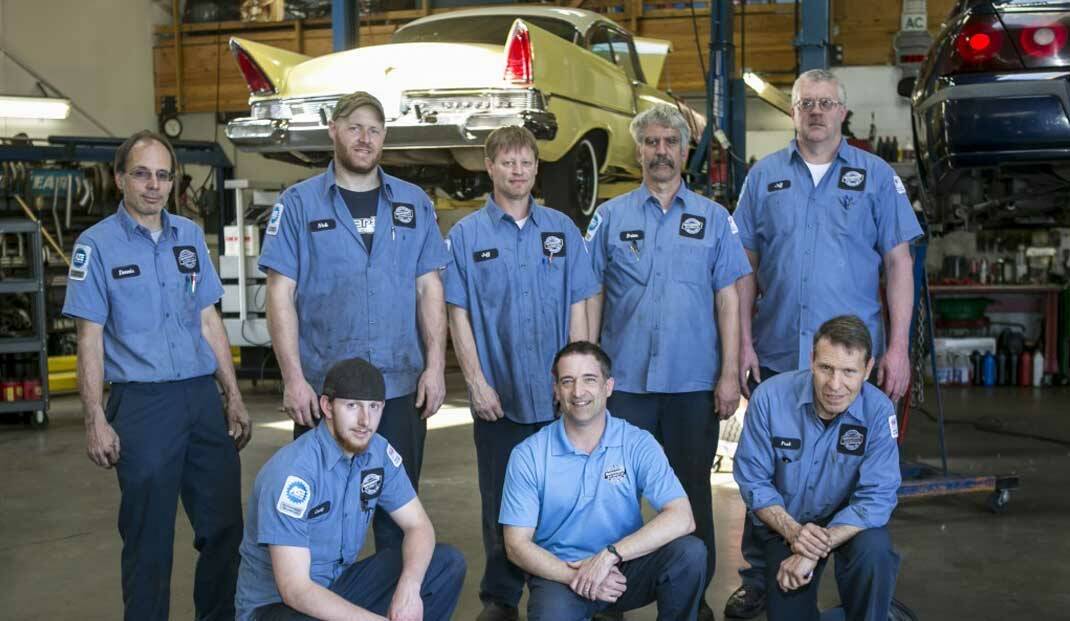 Brian Carlson (pictured top row, second from right) with his Mathewson Automotive colleagues. (Courtesy photo)