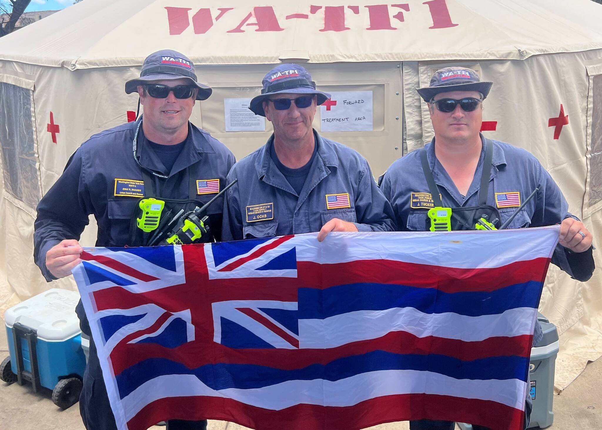 Battalion Chief Ryan Simonds, Battalion Chief Jim Ochs, and firefighter and engineer Jeremy Tucker (left to right). (Courtesy of the Renton Regional Fire Authority.)