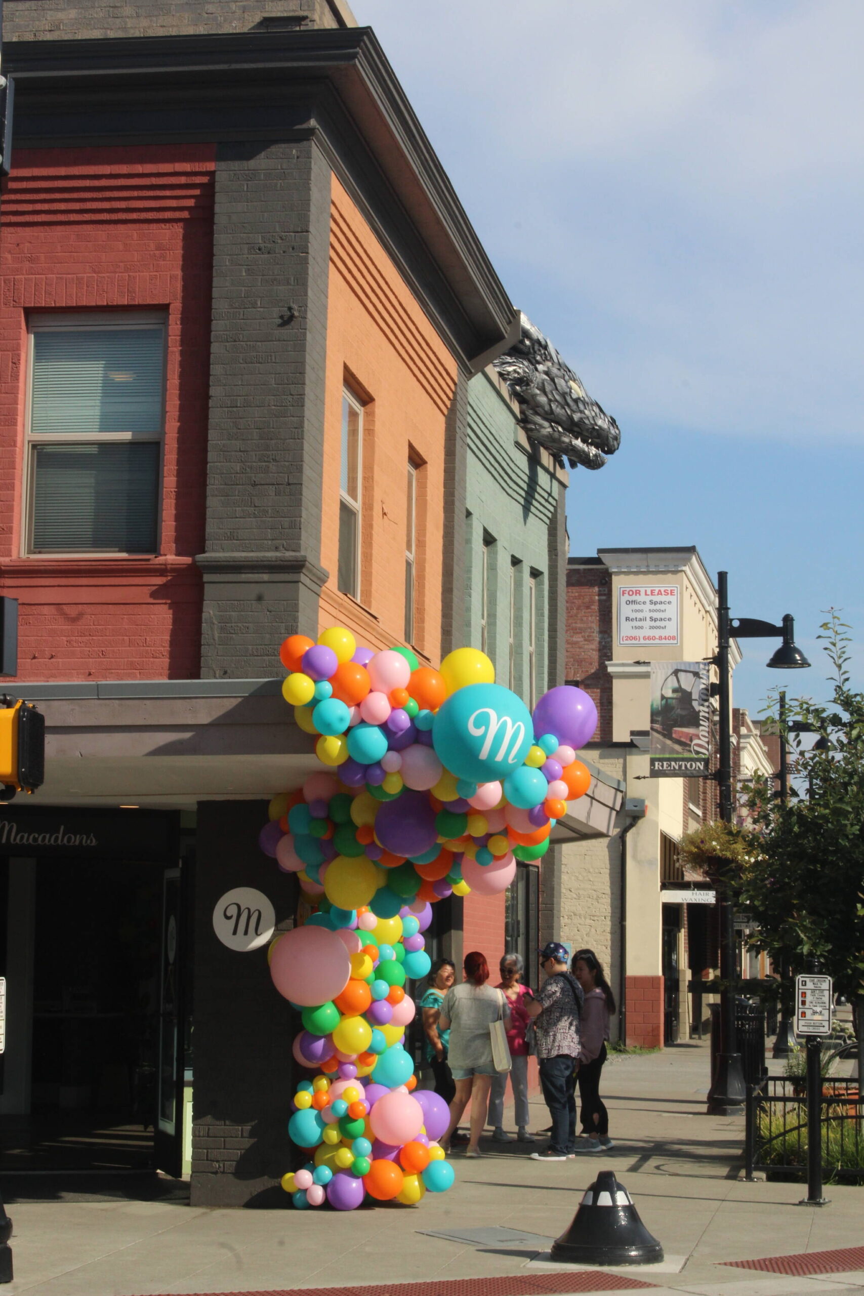 Photo by Bailey Jo Josie/Sound Publishing
Macadons decorated their corner building with colorful balloons.