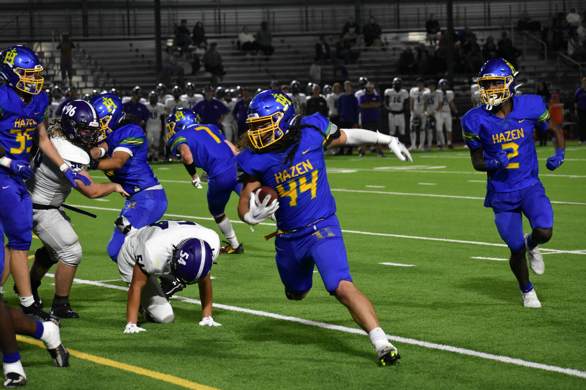 Senior Sione Kongaika tries to turn the corner with the ball in his hands. Ben Ray / The Reporter