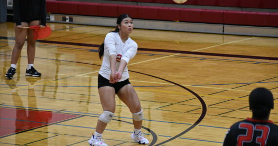 Sherley Martinez with a pass to a teammate in the second set against Tyee. Ben Ray / The Reporter