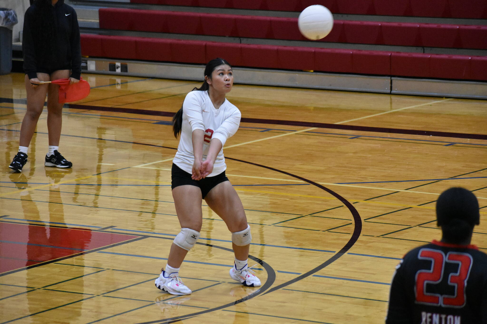 Sherley Martinez with a pass to a teammate in the second set against Tyee. Ben Ray / The Reporter