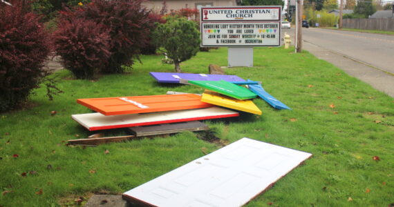 The rainbow doors at United Christian Church of Renton were run over and heavily damaged by an unknown driver. This isn’t the first time the pro-LGBTQ+ church has been vandalized. (Photo by Bailey Jo Josie/Sound Publishing)