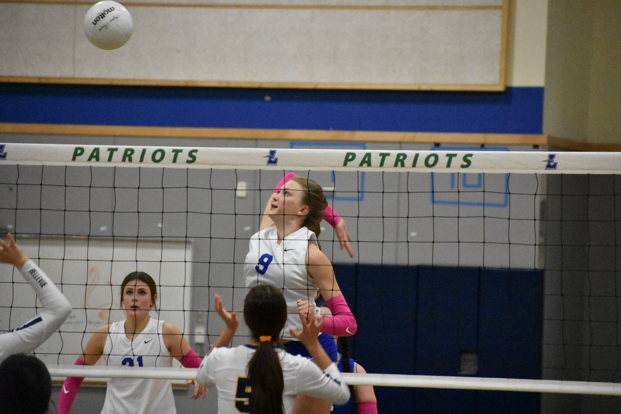 Junior Maiya Lester goes up for a kill. Ben Ray / The Reporter