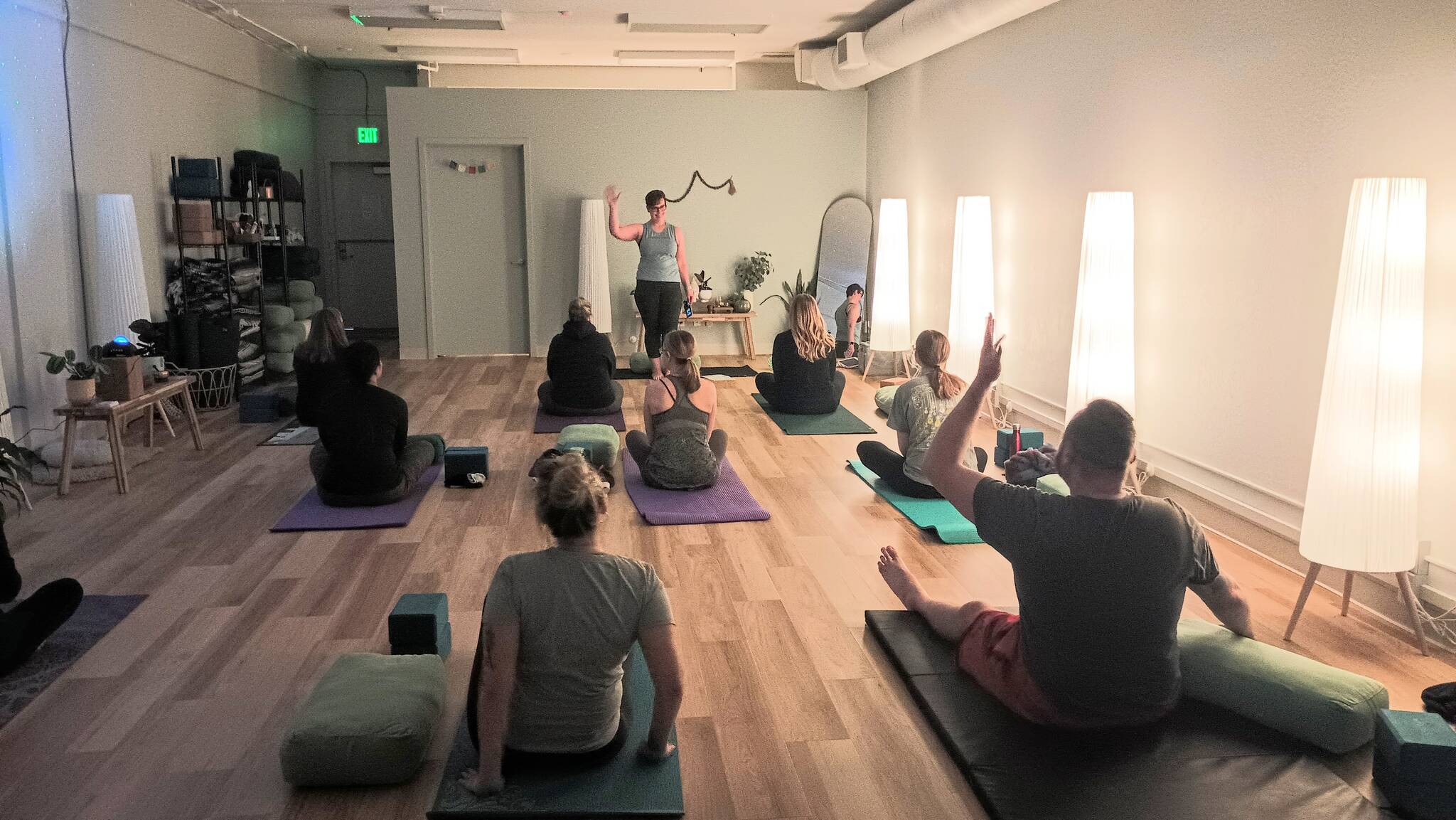 Shortly after the ribbon cutting, a yoga class began at Crown Yoga. Photo by Bailey Jo Josie/Sound Publishing