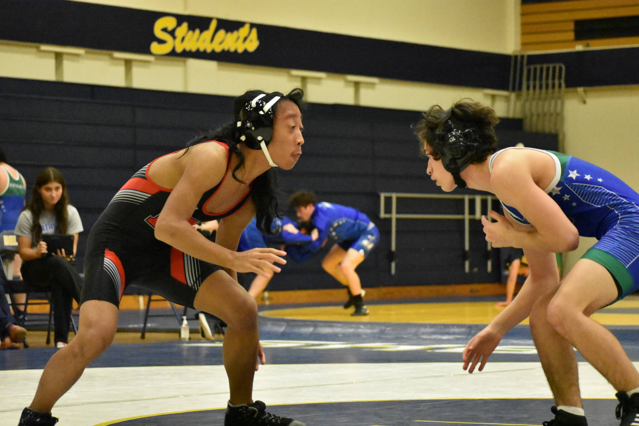 Ben Ray / The Reporter
Redhawk and Patriot wrestlers face off at Bellevue High School.