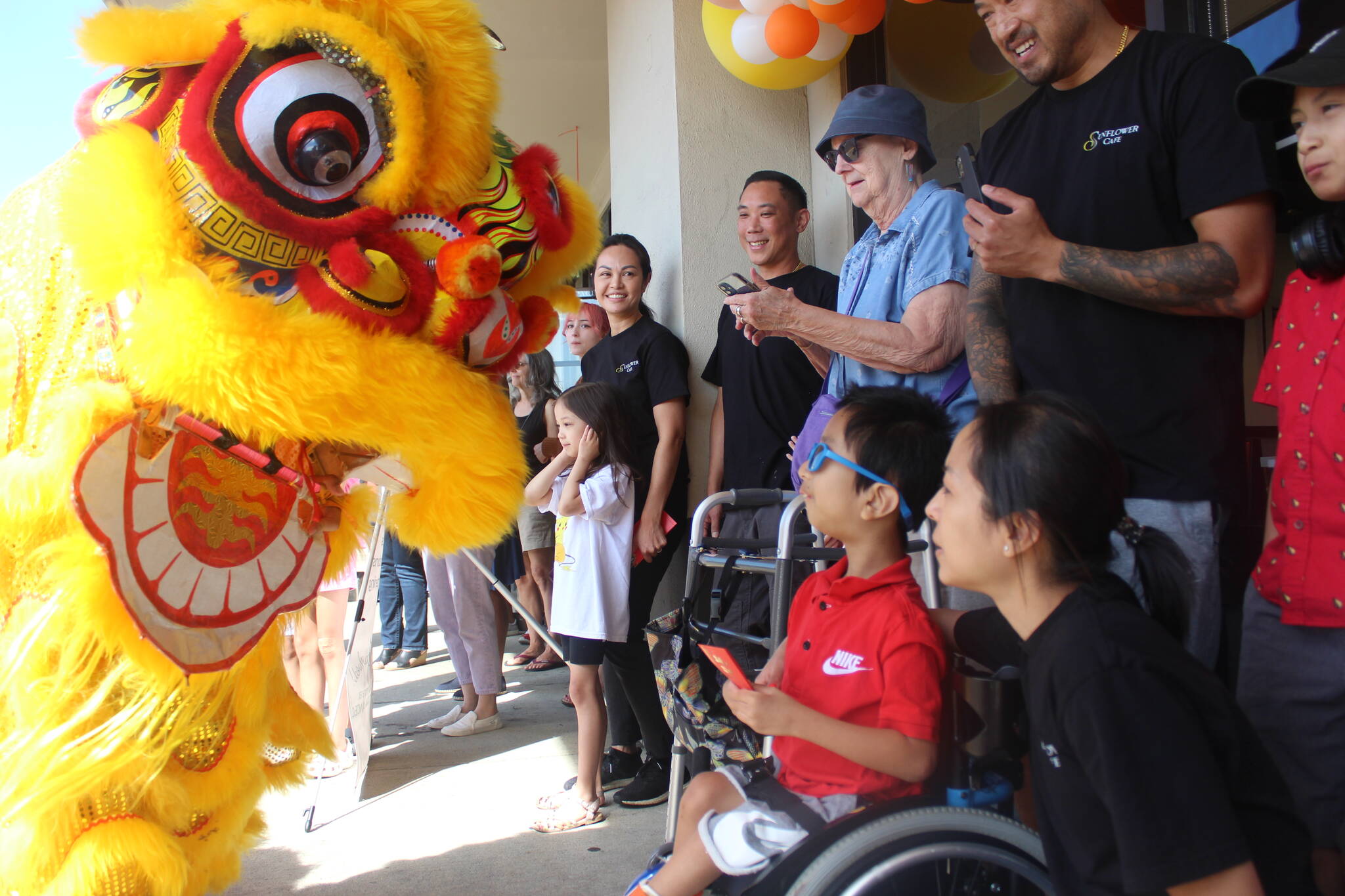 Chinese Lion Dancers impress at the ribbon cutting ceremony for the Sunflower Cafe in Fairwood. (Photos by Bailey Jo Josie/Sound Publishing)