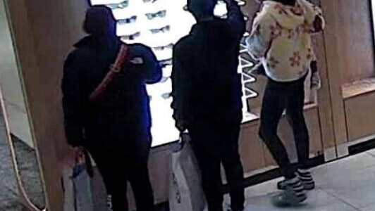 According to the Bellevue Police Department, the suspects would enter the store as a group, steal sunglasses, and conceal them in their clothing and bags before leaving. (Courtesy of court documents.)