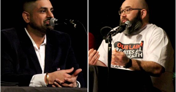 Ramandeep Mann (left) spoke against the Raise the Wage ballot initiative as Michael Westgaard (right) spoke for it during a forum Jan. 31 at Carco Theatre in Renton. (Photo by Bailey Jo Josie/Sound Publishing)