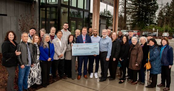 Photo courtesy of Bruce Hudson
Former Seattle Seahawks player Doug Baldwin received a check last month for $42,805 from the Renton Rotary Club. Thanks to the club’s donation, all senior programming during senior times is free during the winter session at the Family First Community Center.