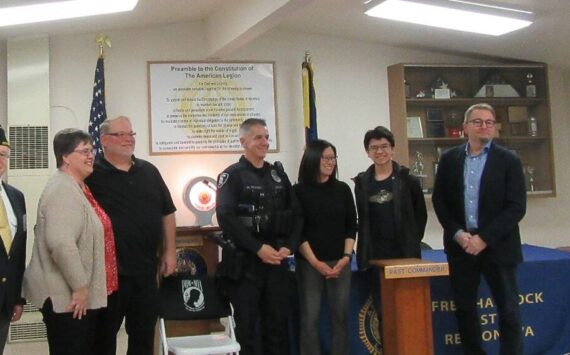 Pictured left to right: James Wilhoit, Kristen and Don Pederson, Officer Traino and wife Michelle and son Chris, Mayor Armondo Pavone. Photo courtesy of James P. Wilhoit