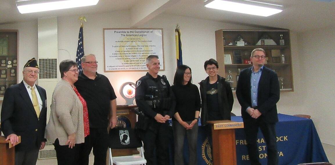 Pictured left to right: James Wilhoit, Kristen and Don Pederson, Officer Traino and wife Michelle and son Chris, Mayor Armondo Pavone. Photo courtesy of James P. Wilhoit