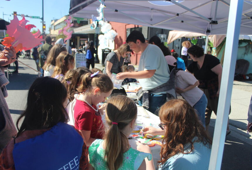 <p>Kids making dragon arts and crafts at the Erasmus hatching party street fair. Photo by Bailey Jo Josie/Sound Publishing.</p>