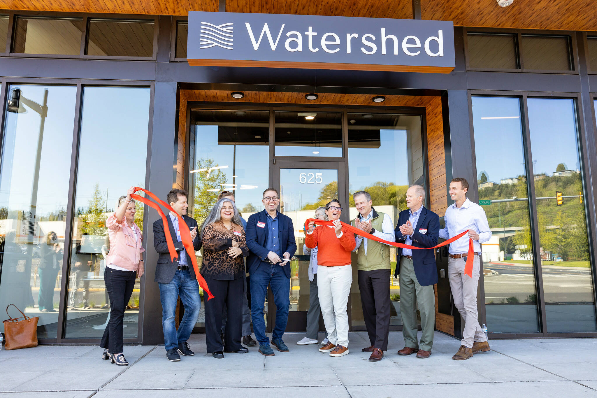 The ribbon-cutting ceremony for the Watershed Apartments took place April 18 with guest speakers and a tour of the facilities, which includes a fitness center, parcel room, rooftop lounge area and more. Courtesy image