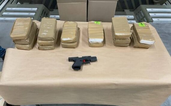 Law enforcement seized more than 15 kilograms of fentanyl powder and a firearm from the suspects’ vehicle on May 9. Agents seized an additional kilogram of fentanyl powder in the search of an apartment of one of the suspects living in Renton. (Courtesy of the Department of Justice.)