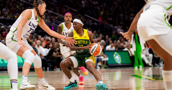 Erica Wheeler drives to the basket against the Minnesota Lynx. Photo courtesy of Seattle Storm.