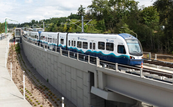 A light rail vehicle parked Aug. 18 on the alignment during the construction of the Star Lake Station in Kent. COURTESY PHOTO, Sound Transit