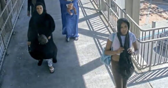 Leavens in the bottom right alongisde other susepcts after leaving Lululemon on Aug. 15, 2023. Screenshot from charging documents.