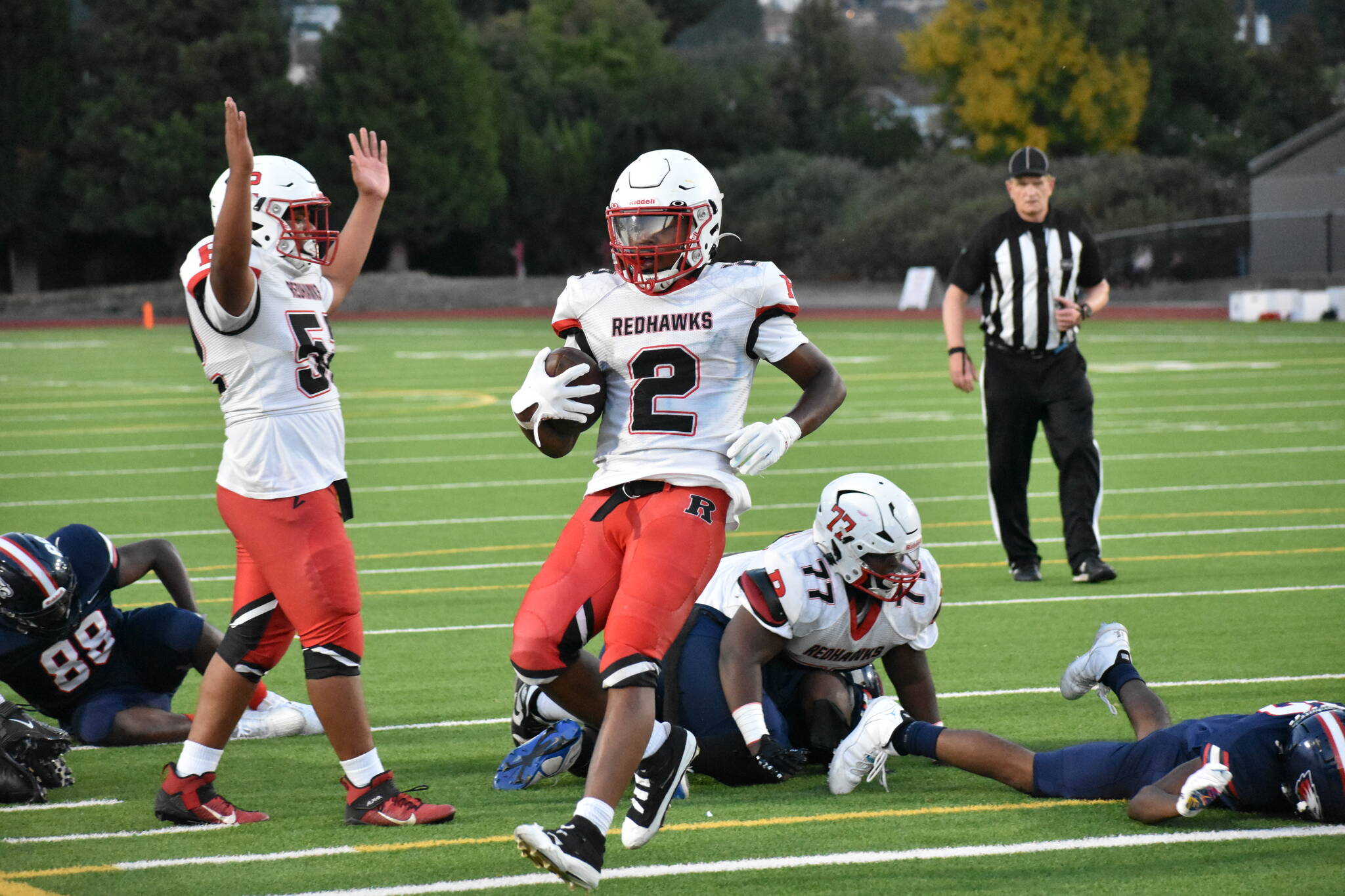 Patrick Turner rushes into the endzone against Lindbergh. Ben Ray / The Reporter