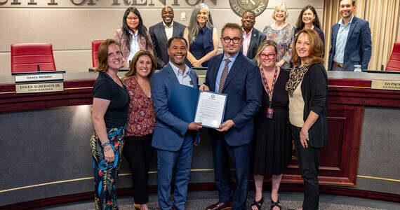 Mayor Armondo Pavone presents the proclamation to Renton Technical College Executive Director of the Office of Innovation and Strategic Partnership Wade Parrott III. Courtesy photo