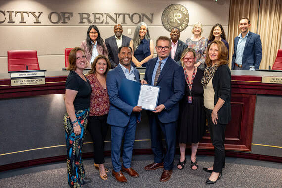 Mayor Armondo Pavone presents the proclamation to Renton Technical College Executive Director of the Office of Innovation and Strategic Partnership Wade Parrott III. Courtesy photo