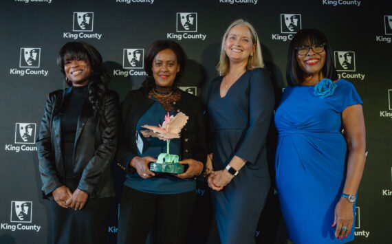 Founder Miny Tefesse accepted the Minority-Owned Small Business of the Year award on behalf of Abyssinia Beauty School.