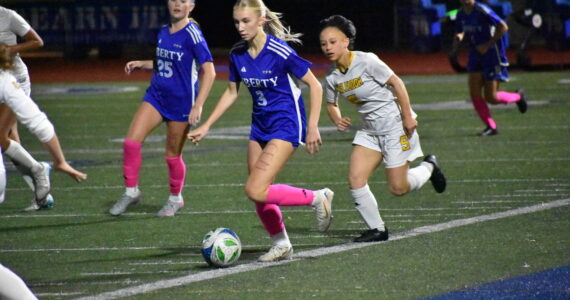 Addie Streur controls the ball in her first start of the season for Liberty. Ben Ray / The Reporter