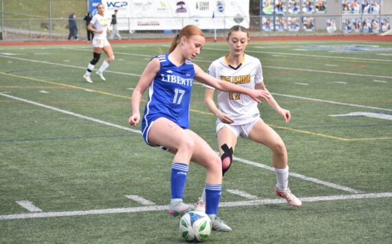 Morgan Ackermann stops the ball for Liberty. Ben Ray / The Reporter