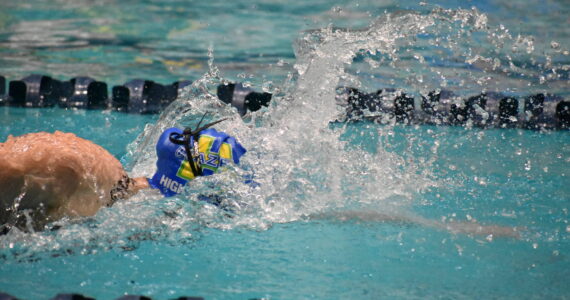Molly McCorriston of Hazen swims en route to her state title. Ben Ray / The Reporter
