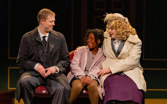 Annie is accompanied by Oliver Warbucks and Grace Farrell to the movies. Photo courtesy of Renton Civic Theatre