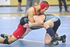 Lindbergh's Isaiah Corwin controls Mount Rainier's Jesse Bame on the way to a win in the 152-pound semifinal match of the Seamount League wrestling championship Saturday at Mount Rainier High School.