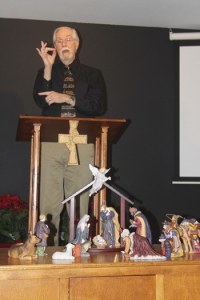 Pastor Fred DeBerry of Calvary Baptist’s Deaf Church in the Highlands uses sign language to communicate his sermons to the congregation. He’s been with the deaf church for 34 years. BELOW: Lynn Chase