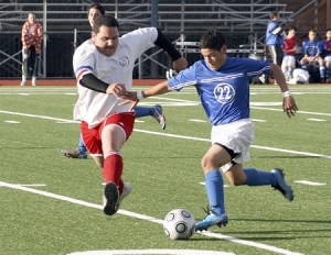 Hazen's Jonathan Betancourt dribbles up the field against Renton this season.